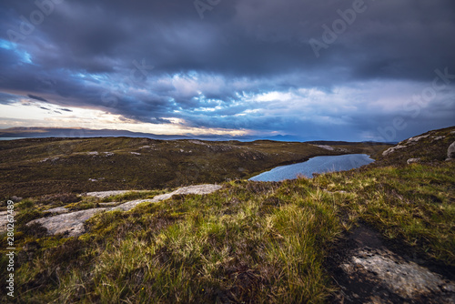 Beautiful scenic landscape of Scotland nature with beautiful evening cloudy sky.