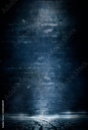 Empty street scene background with abstract spotlights light. Night view of street light reflected on water. Rays through the fog. Smoke, fog, wet asphalt with reflection of lights. 