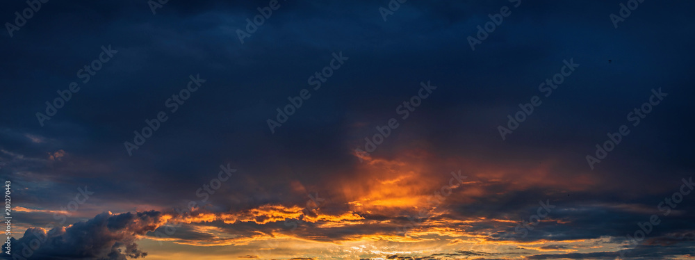 panorama of the sunset sky ,shot on a summer evening