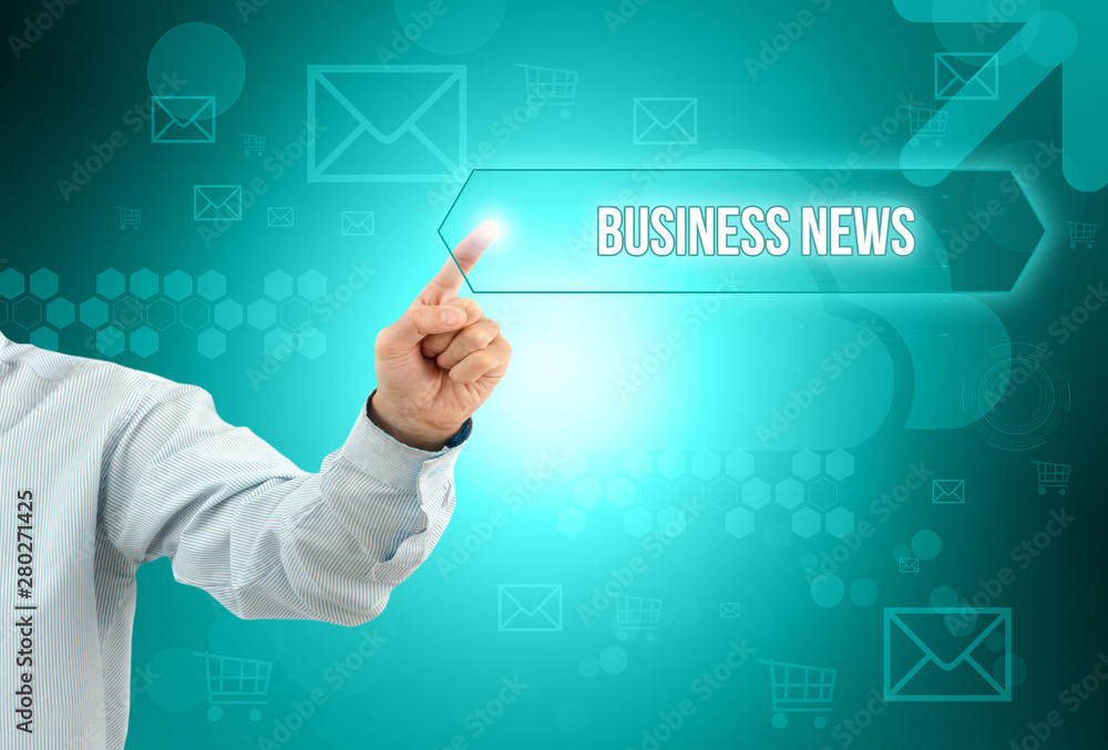 Obraz premium Business man touch a button on an imaginary screen with text BUSINESS NEWS