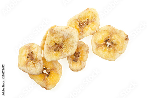 Crunchy banana chips isolated on white background, top view.