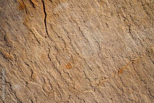 Kamień naturalny, piaskowiec, tekstura przy naturalnym oświetleniu photo