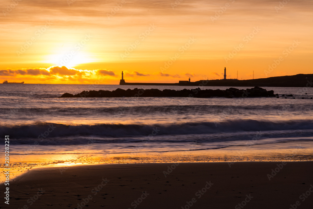 Sunrise at Aberdeen Harbor in Scotland. Long exposure photograph. Sunrise at Aberdeen Harbor in Scotland. Long exposure photograph.
