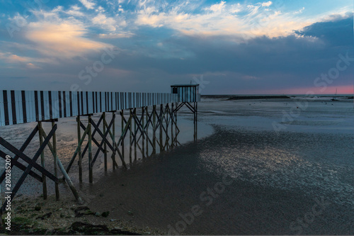 sunset on a dock  the french coast