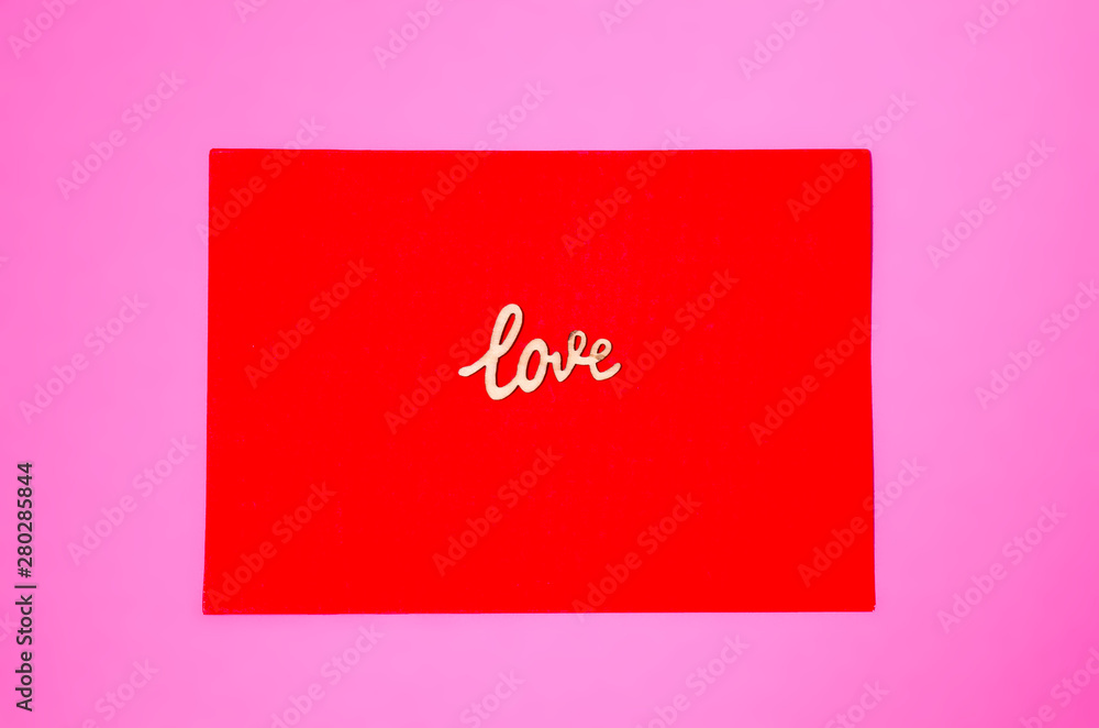 Red envelope on pink background. Sign love. Love concept. Love letter. Paper craft. Red envelope on pink background. Sign love. Love concept. Love letter. Paper craft.