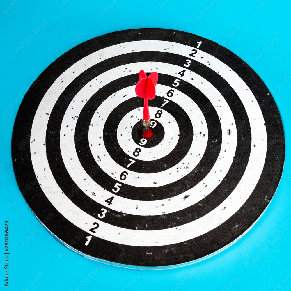 Target with arrow in the center. Hit the target. Target with arrow in the center. Hit the target.