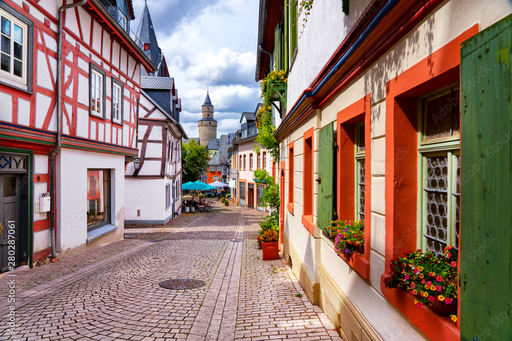 Streets of Idstein town in the Taunus area with half timbered houses on a beautiful summer-day. - obrazy, fototapety, plakaty 