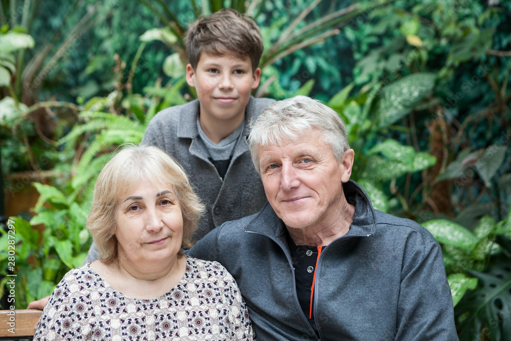 Portrait of grandpa and grandma with their grandson, Caucasian people family Portrait of grandpa and grandma with their grandson, Caucasian people family