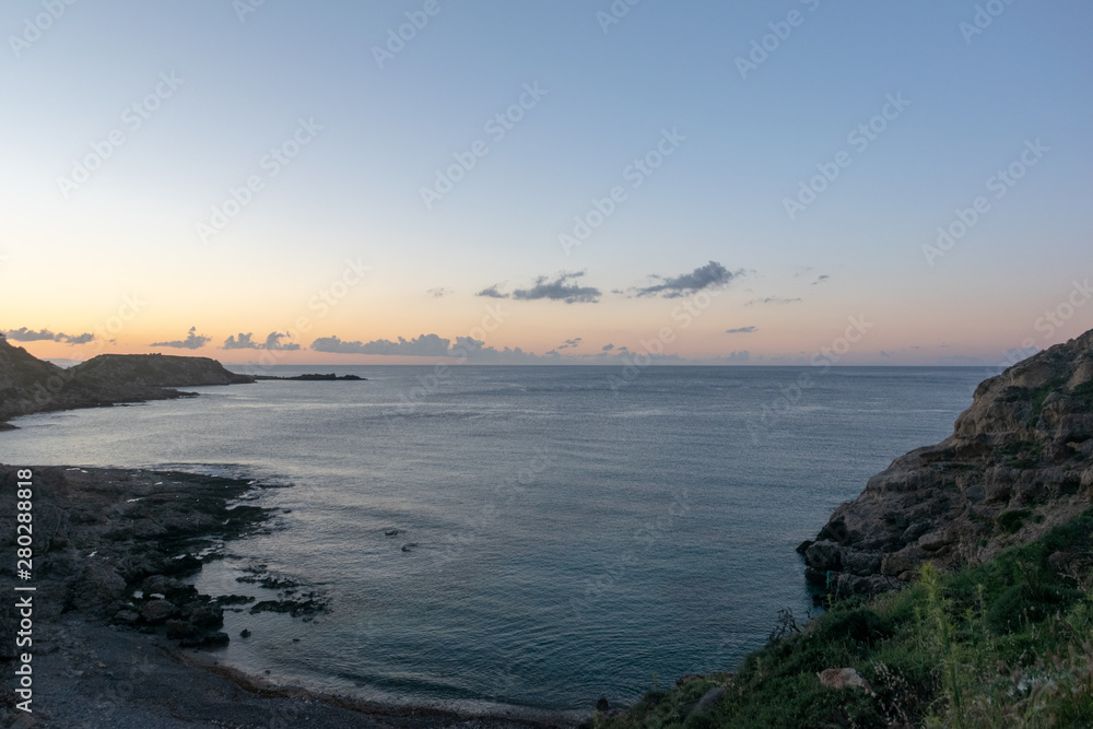 dawn on the mediterranean sea on the beach