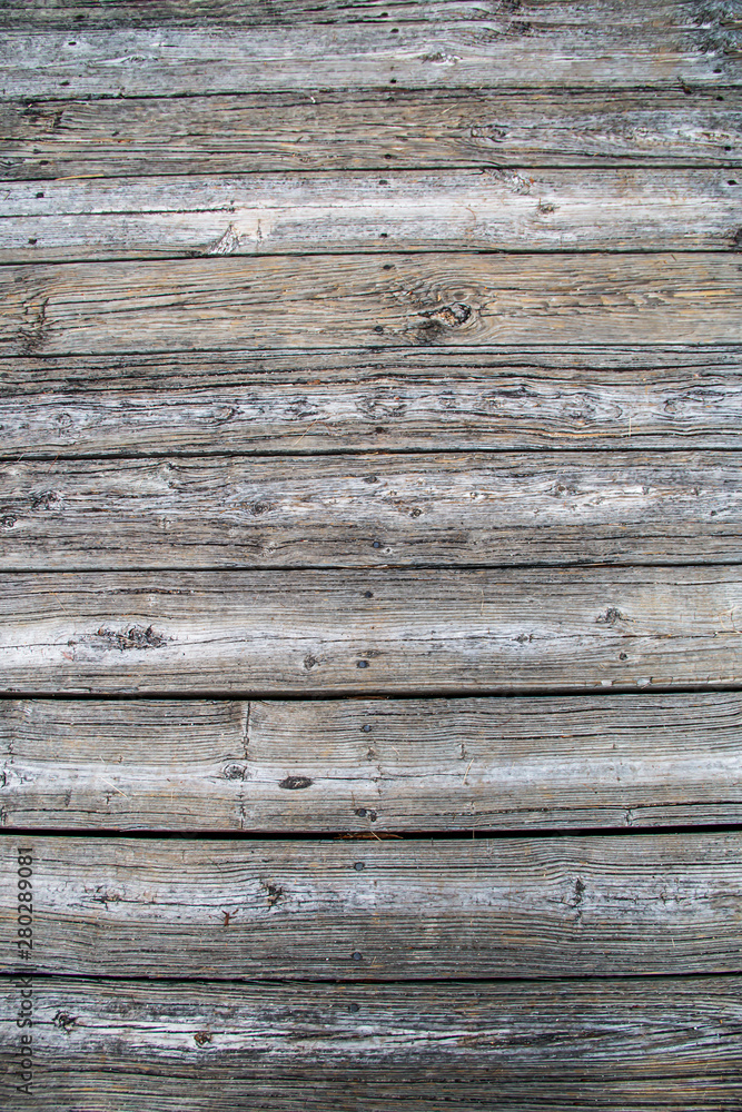 row of wooden planks on a boardwalk row of wooden planks on a boardwalk