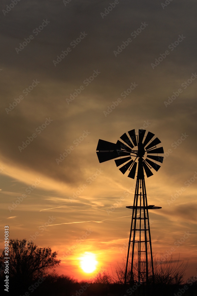 silhouette of a Kansas windmill at sunset silhouette of a Kansas windmill at sunset