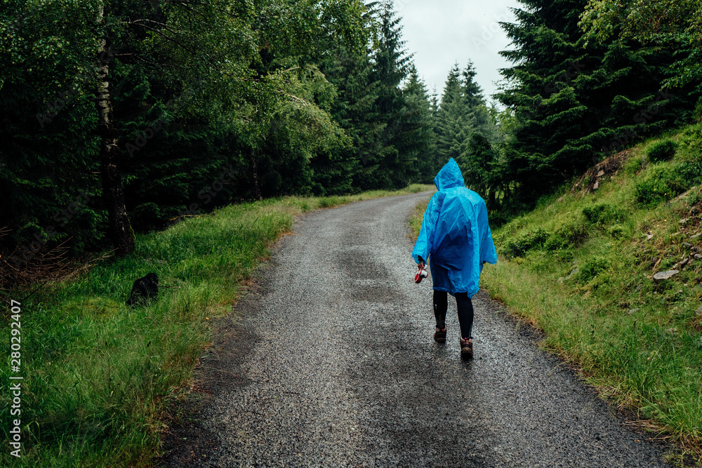 Young woman on the trail in Giant Mountains (Karkonosze), authentic travel experience. Young woman on the trail in Giant Mountains (Karkonosze), authentic travel experience.