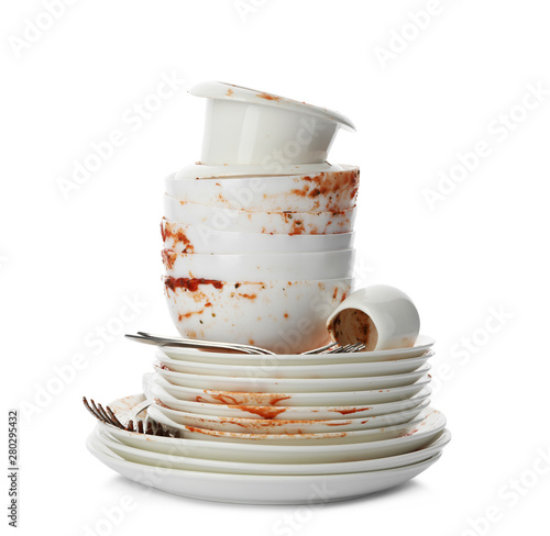 Photos Set of dirty dishes isolated on white