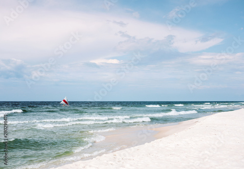 Summer Beach with Sailboat