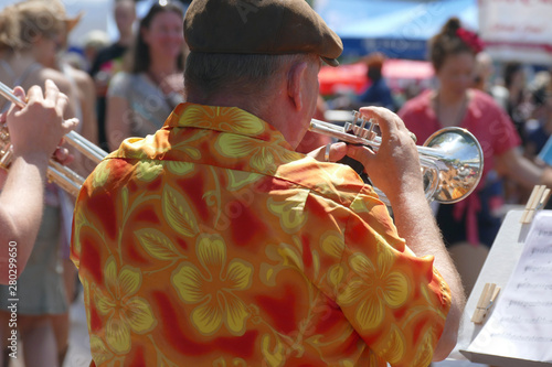 Trumpet player entertains the crowd photo