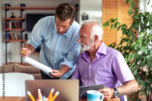 Two businessmen working together