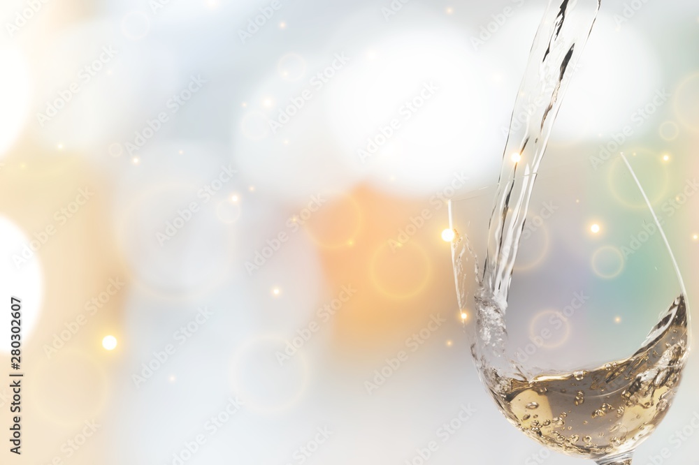 Pouring White Wine into a Glass - Isolated Pouring White Wine into a Glass - Isolated