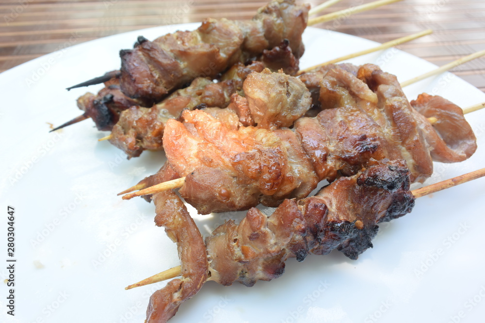 cooked pork skewer in bamboo stick