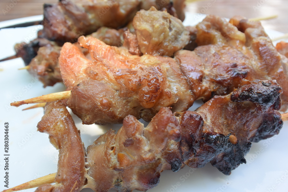 cooked pork skewer in bamboo stick
