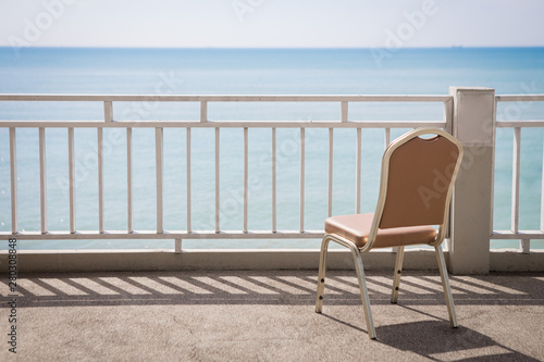 Terrace chair on the sky and sea background