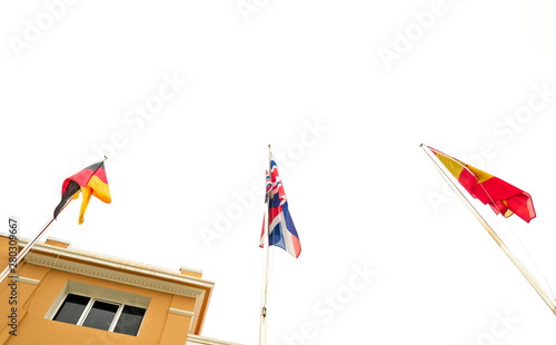 Принти на полотні Three national flags: German, British and Spanish on flagpoles.