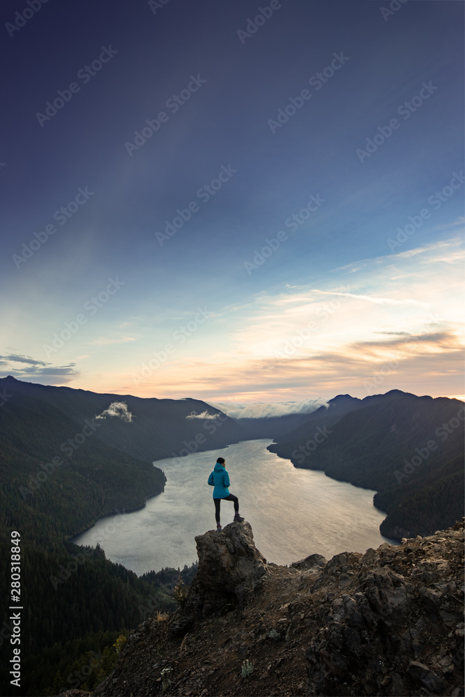 Female Hiker Standing on the Top of Mount Storm King Olympic National Park