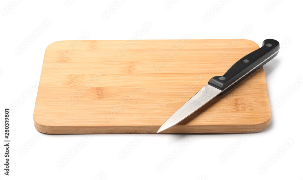 Paring knife and wooden board isolated on white