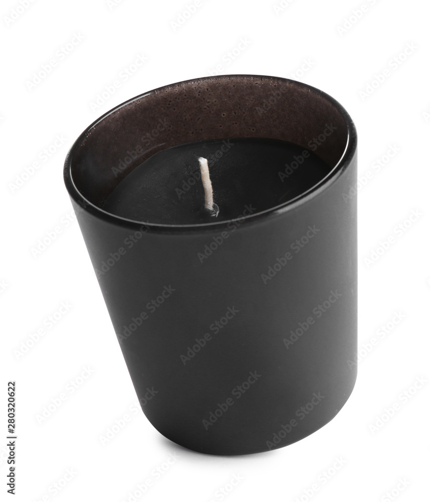 Aromatic candle in black holder isolated on white Aromatic candle in black holder isolated on white