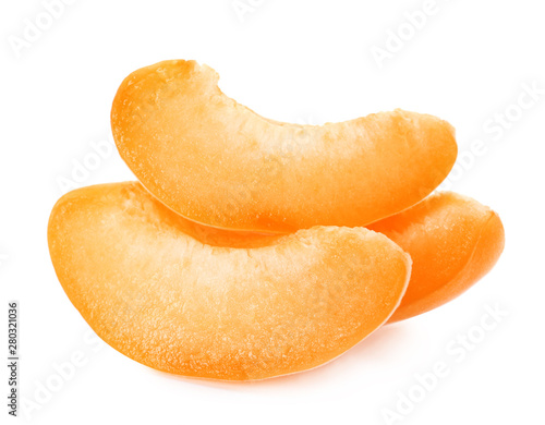 Slices of delicious ripe apricot isolated on white