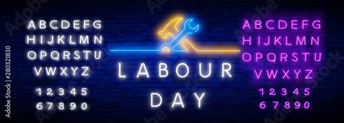 Happy Labor Day banner, logo, emblem and label. Happy Labor Day Neon Text Vector with a Brick Wall Background. Vector Illustration