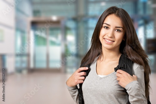 Portrait of a cute young student girl , isolated on background Free Download Portrait of a cute young student girl , isolated on background - GFXLoad