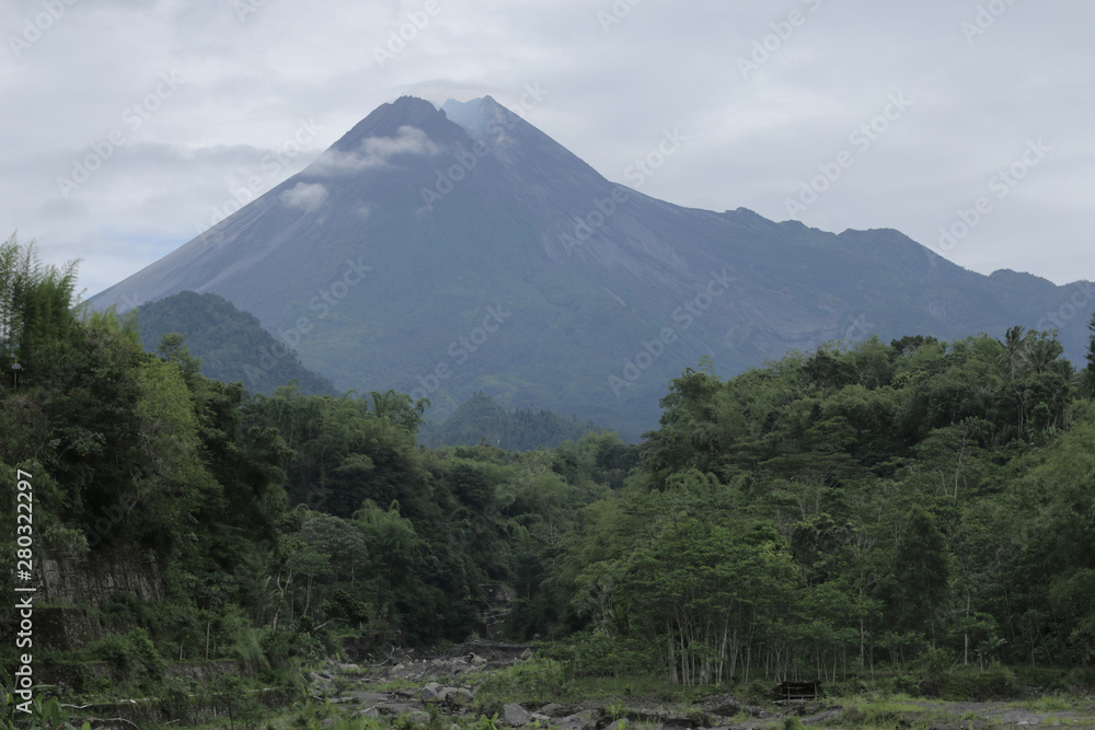 Mount Merapi, Gunung Merapi (literally Fire Mountain in Indonesian and Javanese), is an active stratovolcano located on the border between Central Java and Yogyakarta provinces, Indonesia