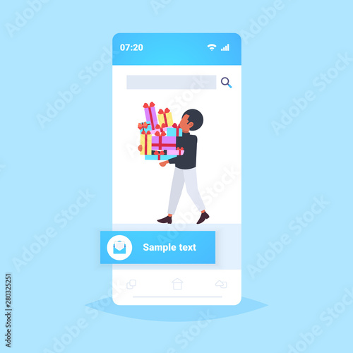 man carrying stack of wrapped gift boxes big seasonal sale shopping concept guy holding colorful presents smartphone screen mobile application flat full length