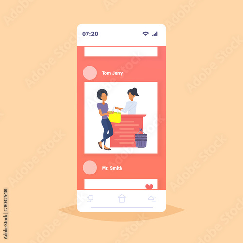 woman customer buying new handbag at cash desk counter fashion shop cloth store female shopping mall online mobile application smartphone screen flat