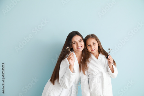 Mother and her little daugh...