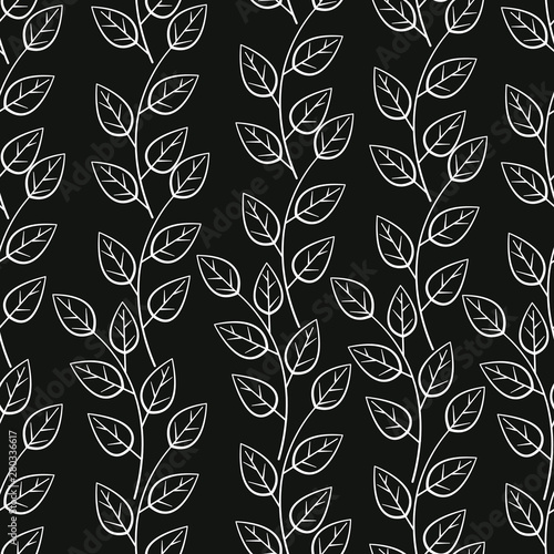 Vector seamless pattern with vertical branches. Simple white branches with leaves on black background. 