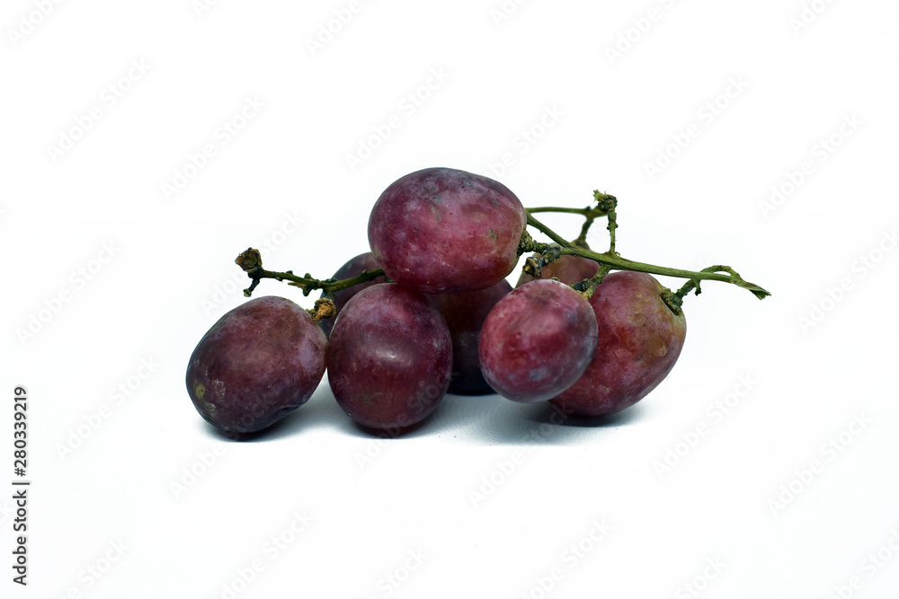 fresh red grapes isolated on a white background