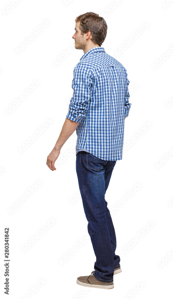 Fototapeta premium Side view of going handsome man.