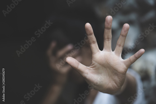 Stop sexual harassment and violence against women, rape and sexual abuse concept,  STOP gesture with hand, Stop drugs,  human rights violations, human trafficking, Copy space. photo