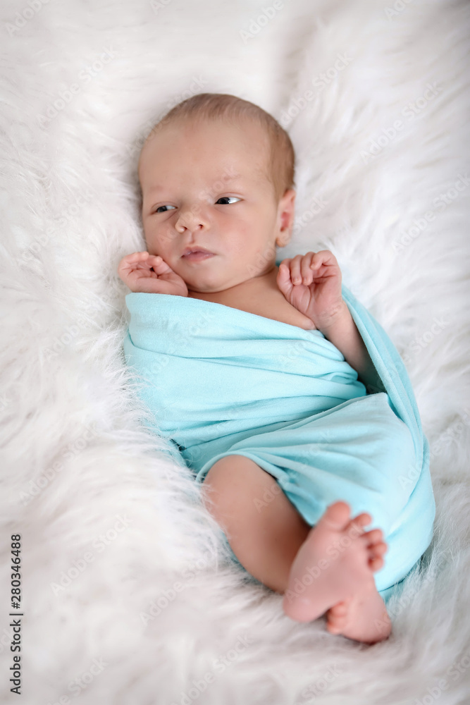 newborn baby sleeps wrapped in a blanket. concept of childhood, healthcare, IVF newborn baby sleeps wrapped in a blanket. concept of childhood, healthcare, IVF