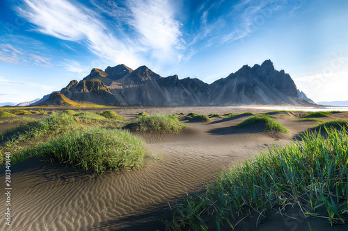 Fototapeta Naklejka Na Ścianę i Meble -  Fantastic sunny day and gorgeous black sand dunes on Stokksnes cape in Iceland.