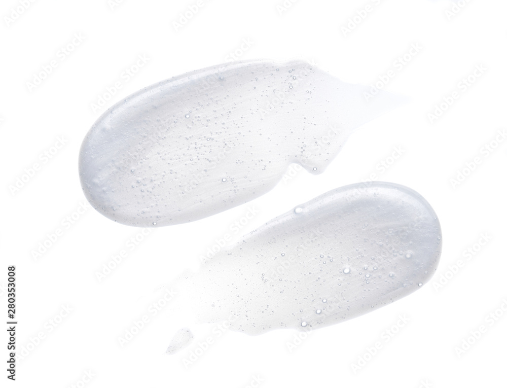 Pearly white smears and texture of face cream or acrylic paint isolated on white background Pearly white smears and texture of face cream or acrylic paint isolated on white background