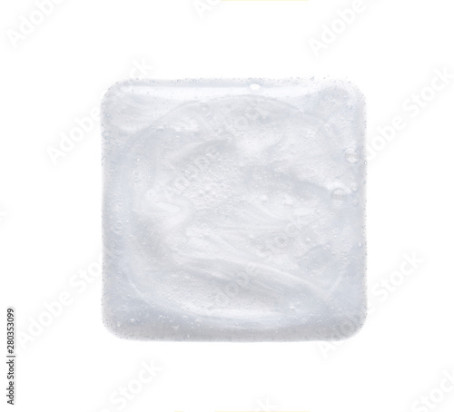 Pearly white smears and texture of face cream or acrylic paint isolated on white background