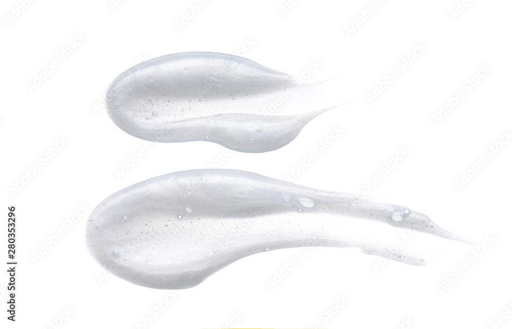 Pearly white smears and texture of face cream or acrylic paint isolated on white background Pearly white smears and texture of face cream or acrylic paint isolated on white background