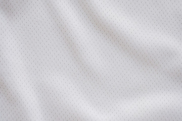 White fabric sport clothing football jersey with air mesh texture background