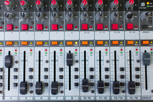 Analog sound mixer. Professional audio mixing console radio and television broadcasting. Horizontal shot.
