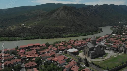 Aerial video of ancient church Sveti Tskhoveli. Georgia, Mtskheta. Close up flight to the Monastery