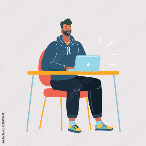 Portrait of young man sitting at his desk in the office