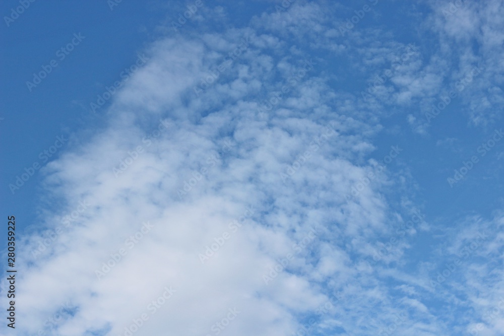 Beautiful clouds floating on the vast blue of the sky Beautiful clouds floating on the vast blue of the sky
