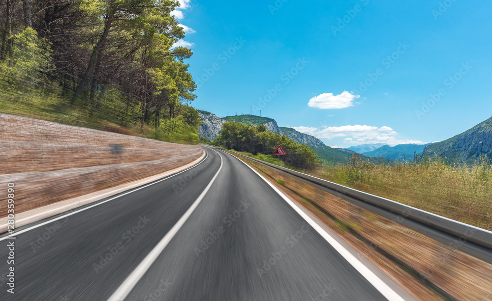 Fototapeta premium Mountain road on a summer sunny day.